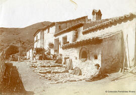 Malaga (provincia), vivienda rural en los montes de Málaga con sus habitantes. Fotógrafo desconocido.