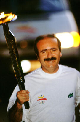 Portando la llama olímpica en su paso por Málaga. Julio de 1992