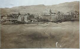 Málaga, la ciudad desde el puerto, Cortina del Muelle y torre de la iglesia de San Juan. Fotógrafo desconocido.